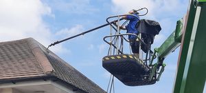 Cherry picker roof power clean